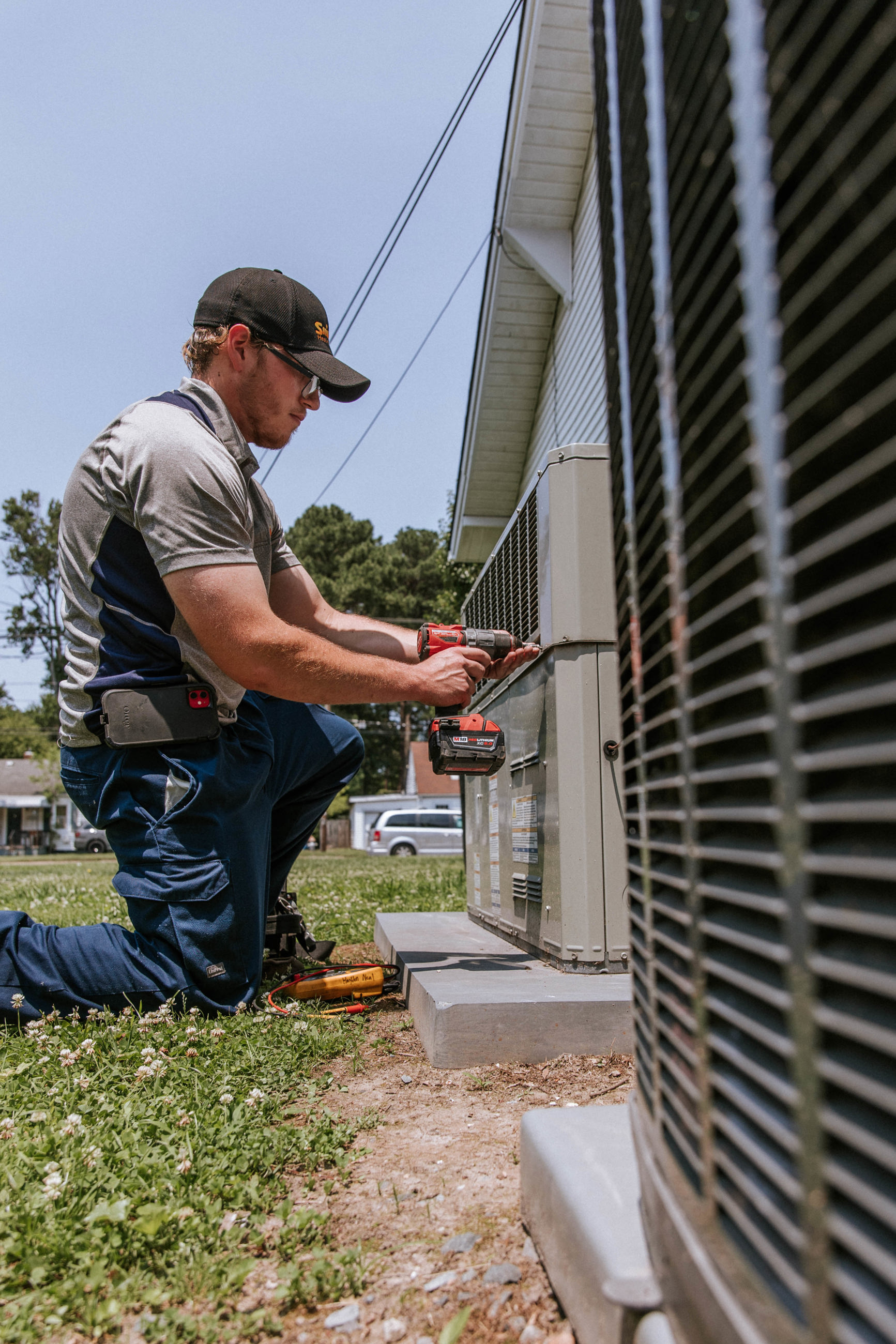 Tech working on unit