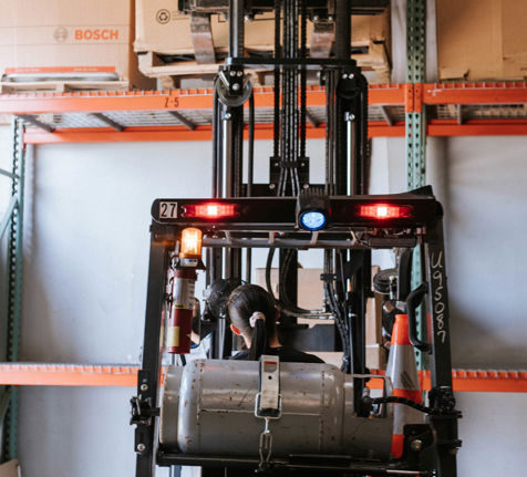 Forklift in warehouse