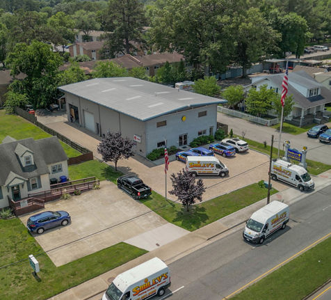 Aerial view of building and vans