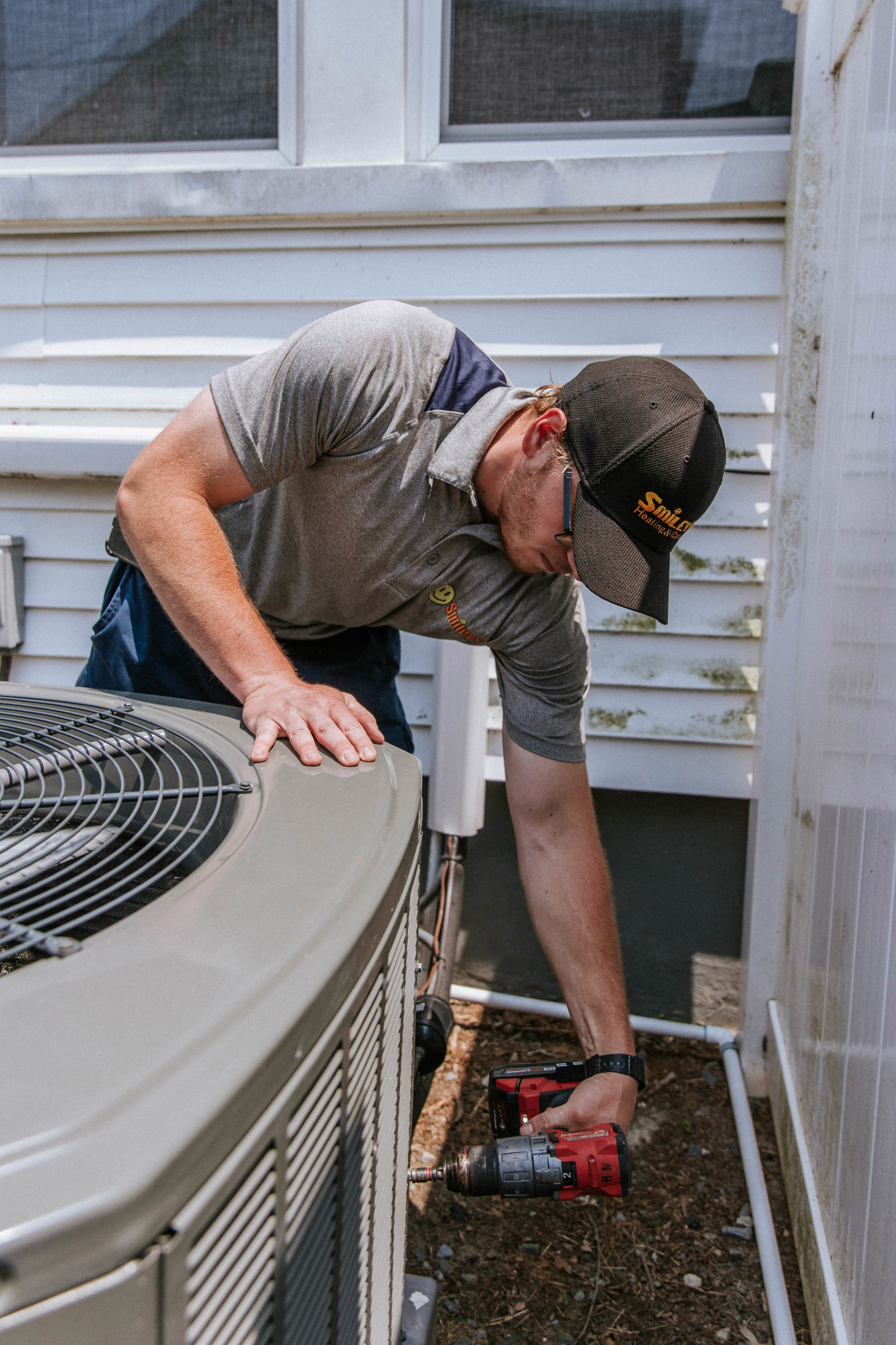 Tech working on unit